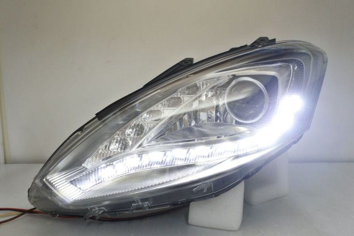 2014/04- M7 TURBO 正廠魚眼 大燈 HID空件.沿用原車燈管和安定器
