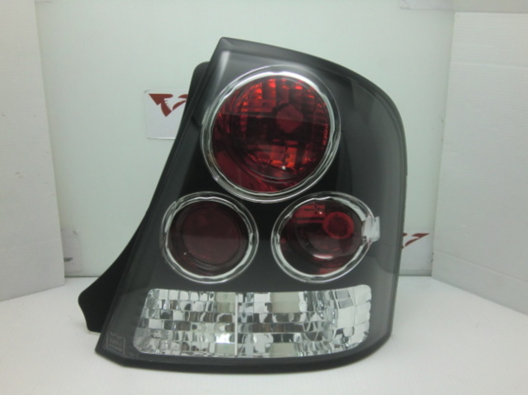 1999-2003 PROTEGE 323 4門 黑底三圓 尾燈 (缺貨)